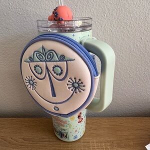 Disney parks It’s a small world tumbler with hippo straw topper and pouch. New